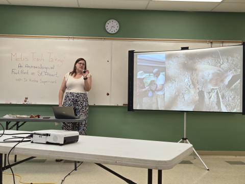 Dr. Kisha Supernant shows archeological findings